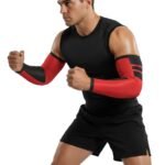 Model wearing black rugby arm compression sleeves demonstrating fit and performance support