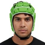 Male rugby player wearing a soft shell protective headguard, facing forward to show the fit and coverage of the rugby headgear.
