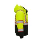 Side view of a navy industrial workwear jacket with contrasting black panels and reflective tape on the sleeve.