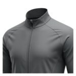 Close-up view of a lightweight soccer jacket, focusing on the full-length zipper, stand collar, and smooth wind- and water-resistant fabric with a small logo icon.