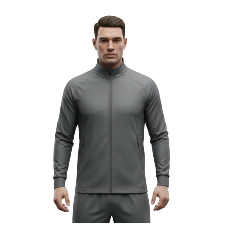 Model wearing a lightweight soccer jacket, standing to show the full-zip front, stand collar, long sleeves, and streamlined athletic fit with a small logo icon.
