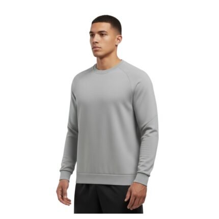 Model wearing a soccer player sweatshirt, standing to show the relaxed pullover fit, long sleeves, and bold front logo icon.