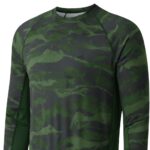 Close-up view of a soccer long sleeve performance shirt showing the smooth thermal fabric, neat crew neckline, and crisp printed chest logo icon.