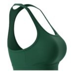 Side view of scoop neck strappy tennis sports bra showing athletic fit and design