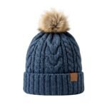 Blue winter beanie hat displayed on a plain background.