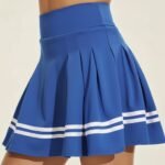 Back view of women’s badminton skorts on a model, showing the smooth waistband, flared mini skirt, and quick‑dry fabric designed for full‑range movement during play.