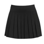 Women’s light gray golf skort shown from the front on a model, with a smooth pull-on waistband and above-the-knee length
