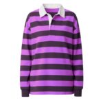 Front view of women’s rugby long sleeve shirt with buttoned collar and chest logo icon, displayed on a plain background.