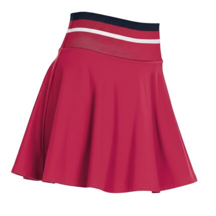Front view of women’s high performance tennis skort on a model, featuring a flat waistband, smooth front panel, and built‑in shorts designed for coverage and easy movement on court.