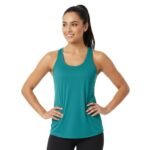 Model wearing women’s quick-dry tennis tank top, front view, with racerback performance fit.