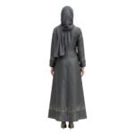 Back view of woman wearing a black abaya, full-length modest dress