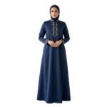 Front view of woman wearing a uniquely styled black abaya, full-length modest dress