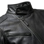 Close‑up view of a men’s biker jacket showing zipper, collar, and panel details.