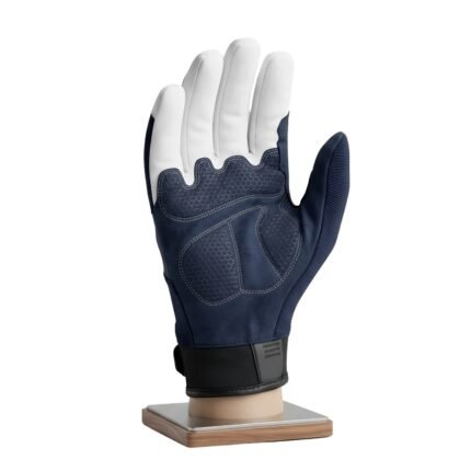 Pair of dirt bike gloves front view on a plain background.