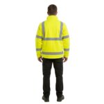 Male model wearing custom bright yellow hi-vis softshell safety jacket with silver reflective strips – back view