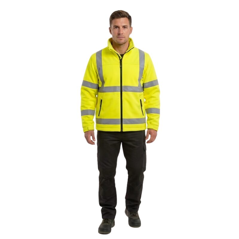 Male model wearing custom bright yellow hi-vis softshell safety jacket with silver reflective strips – front view