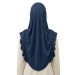 Back view of a Muslim woman wearing an Islamic hijab.