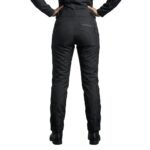 Female model wearing ladies’ motorbike pants back view, showing full-length protective riding trousers from behind.