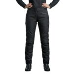 Female model wearing ladies’ motorbike pants front view, showing full-length protective riding trousers and fit.