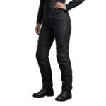 Female model wearing ladies’ motorbike pants side view, showing the profile fit of full-length protective riding trousers.