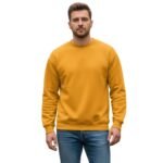 Male model wearing a men’s basketball sweatshirt, showing the classic crewneck, long sleeves, ribbed cuffs and hem, and small chest logo icon, styled with casual athletic bottoms.