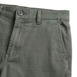 Men’s casual pants laid flat on a plain background.