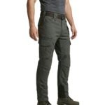 Male model wearing men’s motorbike pants side view, showing the profile fit of full-length protective riding trousers.