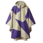 Waterproof rain poncho laid flat, showing hood, wide sleeves, and front placket design.