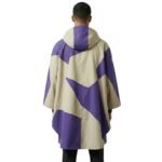 Male model wearing a waterproof rain poncho back view, showing full rear coverage and hood design.
