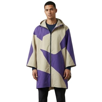 Male model wearing a waterproof rain poncho front view, showing hood, wide coverage, and relaxed fit.