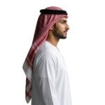 Side view of a model wearing a traditional shemagh kufiya scarf.
