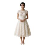 Elegant short wedding dress displayed on a mannequin.