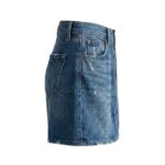 Side view of custom trendy denim mini skirt showcasing silhouette and Y2K retro style, manufactured by Eco Jersey Limited