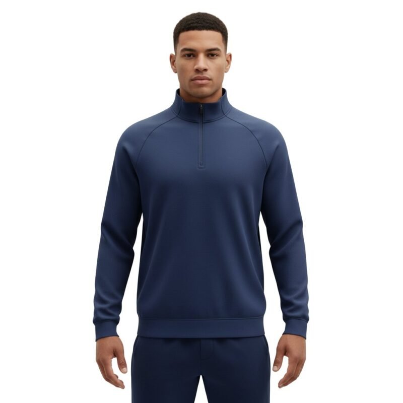 Model wearing a soccer quarter-zip training shirt, standing in a relaxed pose to show the athletic fit, stand collar, and long sleeves
