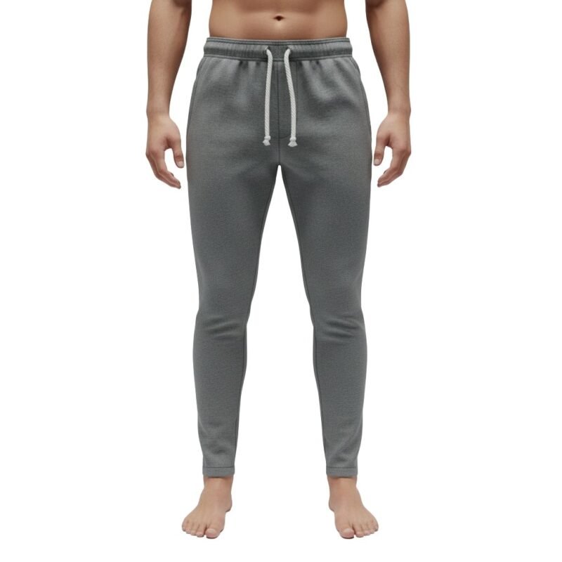 Full front view of soccer sweat pants laid flat, featuring an elastic waistband with drawstring, tapered legs, and cuffed ankles for a relaxed athletic fit.