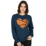 Model wearing a women’s basketball sweatshirt, standing to show the front view with crew neckline, long sleeves, ribbed hem, and small logo icon on the chest.