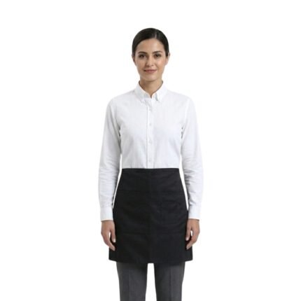 Woman wearing a white shirt, black waist apron, and black trousers in a professional server uniform.