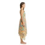 Side view of women’s sundress on model against white background