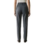 Back view of a model wearing women’s tailored trousers.