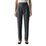 Front view of a model wearing women’s tailored trousers.