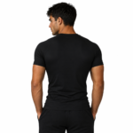Back view of model wearing compression T-shirt showing full sleeve and back coverage for sports and medical muscle support use