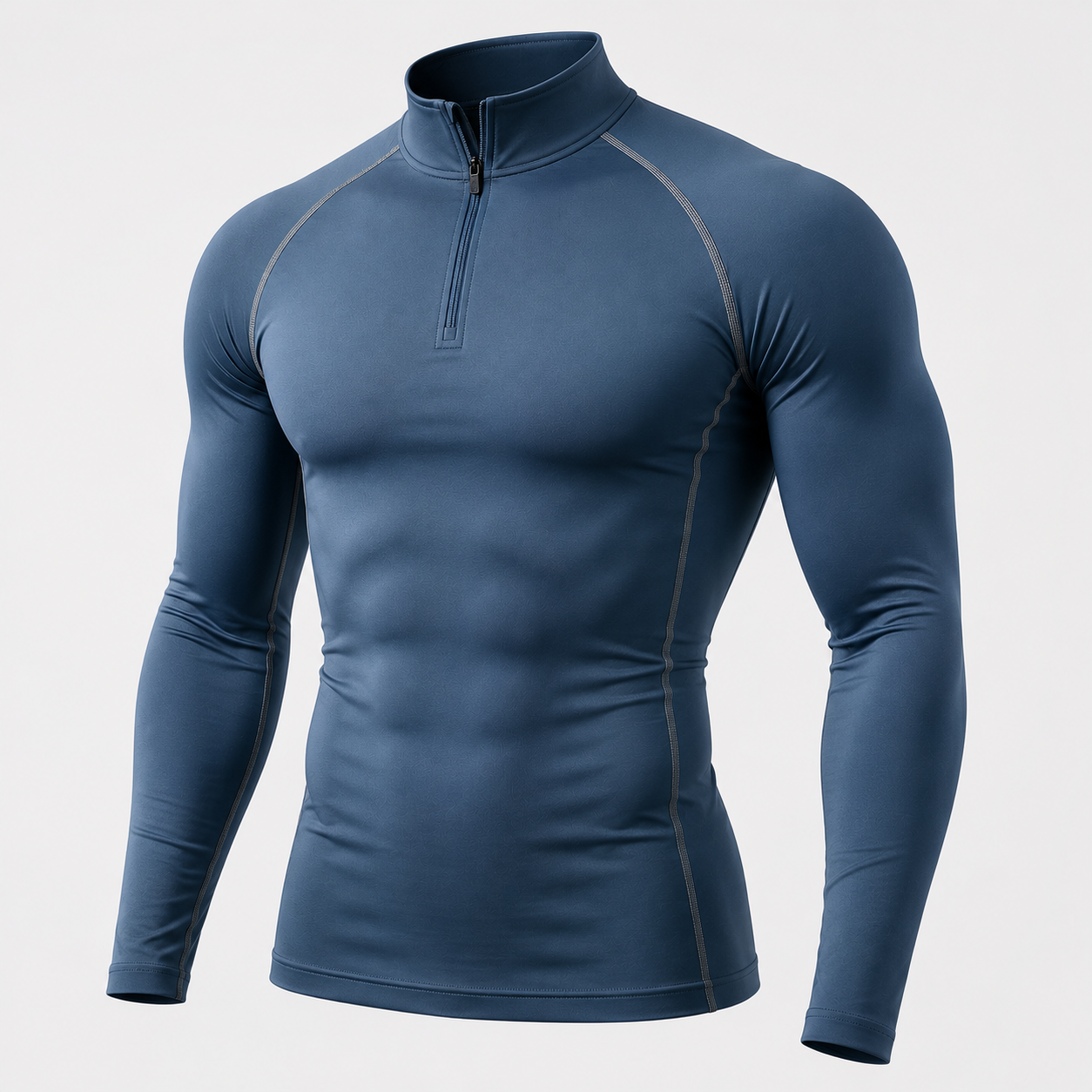 Half-zip long sleeve compression shirt in steel blue with quarter zip collar and contrast raglan stitching