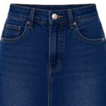 Close-up view of classic long high waisted denim skirt showing denim fabric texture, waistband and stitching quality detail