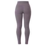 Back view of a pair of solid grey-purple, high-waisted women's yoga leggings, showing their form-fitting silhouette and subtle seam detailing, displayed on a plain white background.